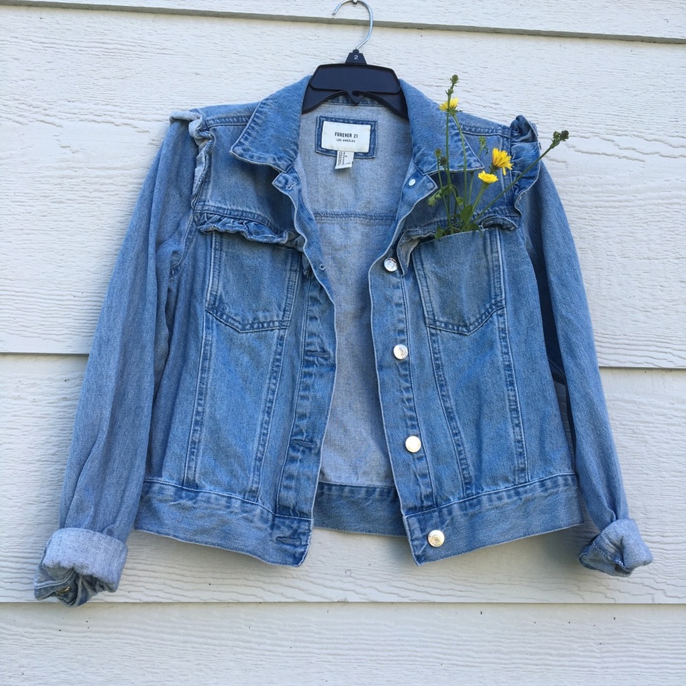 Worn a few times jean jacket with ruffles